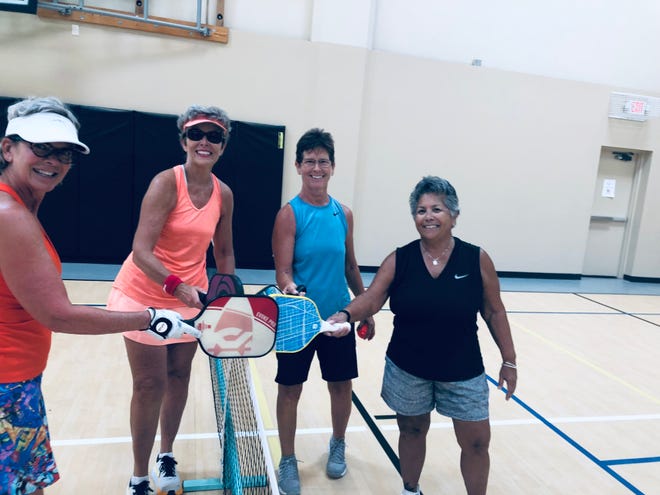 Pickleball players compete in a round robin tournament in Palm Desert on June 5, 2022.