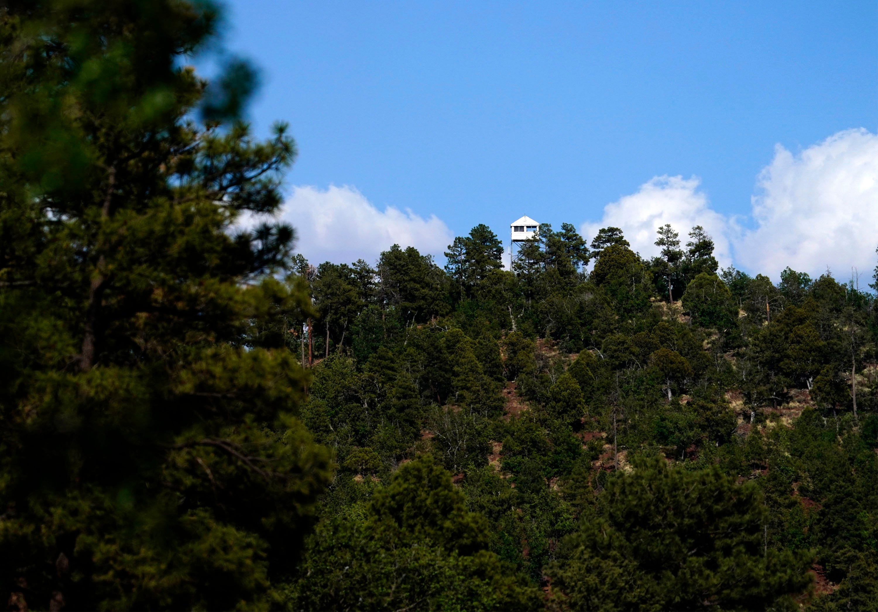 A fire outlook tower is perched above Pinetop-Lakeside.