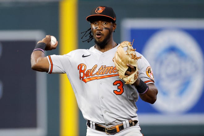 Baltimore Orioles shortstop Jorge Mateo throws to first base for an out after fielding a ground ball from Kansas City Royals' Carlos Santana during the fourth inning of a baseball game in Kansas City, Mo., Friday, June 10, 2022. (AP Photo/Colin E. Braley)
