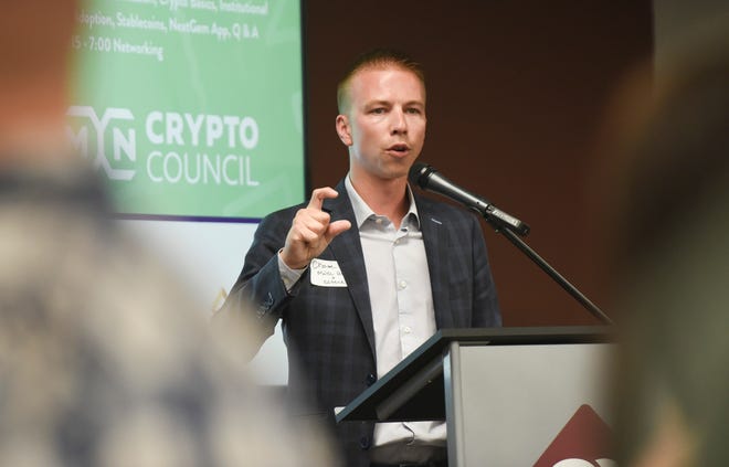 Chase Larson, director of lending for St. Cloud Financial Credit Union, speaks as a board member of the new MN Crypto Council on Tuesday, June 14, 2022, at St. Cloud Financial Credit Union.