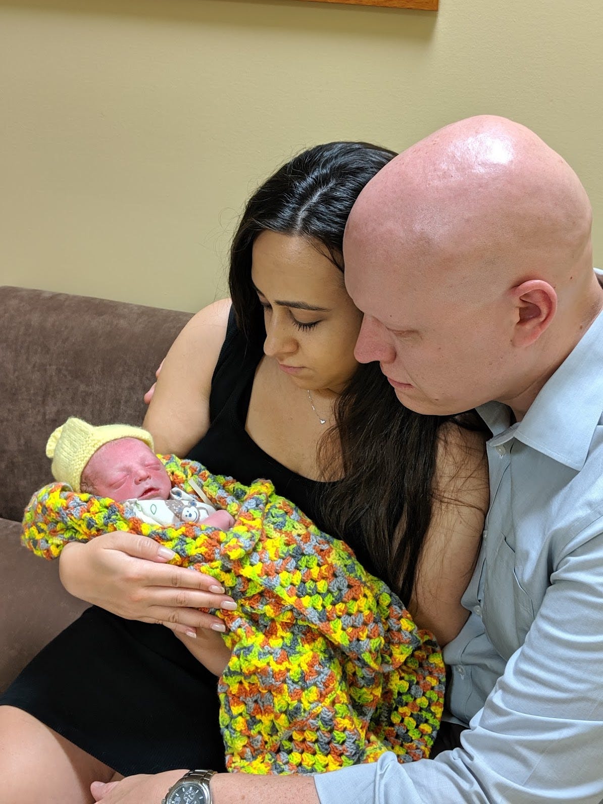 Marny Smith and Michael Frederick spend time with their stillborn son, Heath, in 2019.