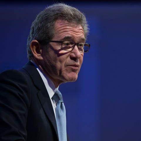 Lord John Browne addresses an audience during the 