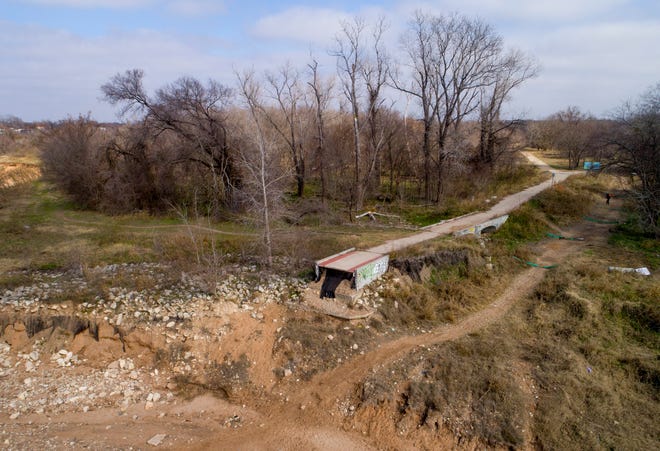 A pedestrian bridge in Southeast Austin's Roy G. Guerrero Park was destroyed by flooding in 2015.