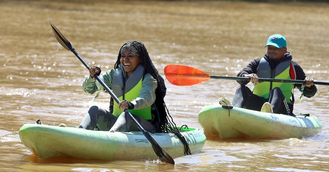 Janiya Winchester and teammate Trevor Jones take part in the kayak portion of the short course Adventure Race at the Catawba Riverkeeper Boathouse on Willow Drive in McAdenville Saturday morning, April 2, 2022.