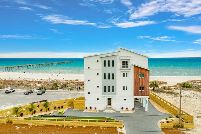 Bidders must register in advance to bid on this house at 12401 Front Beach Road and bring a $50,000 cashier's check.