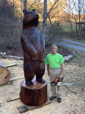 John Beaudet — known to many by his trail name Bodacious — has been carving bears out of downed logs for a little over a decade. Last summer he found a huge white pine tree that had come down on a National Forest Service road and carved out of it this 9-foot-tall bear, his biggest yet.