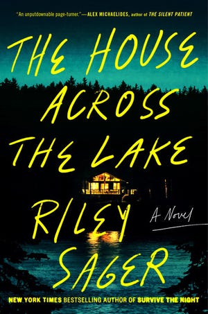 "The house on the other side of the lake," by Riley Sager.