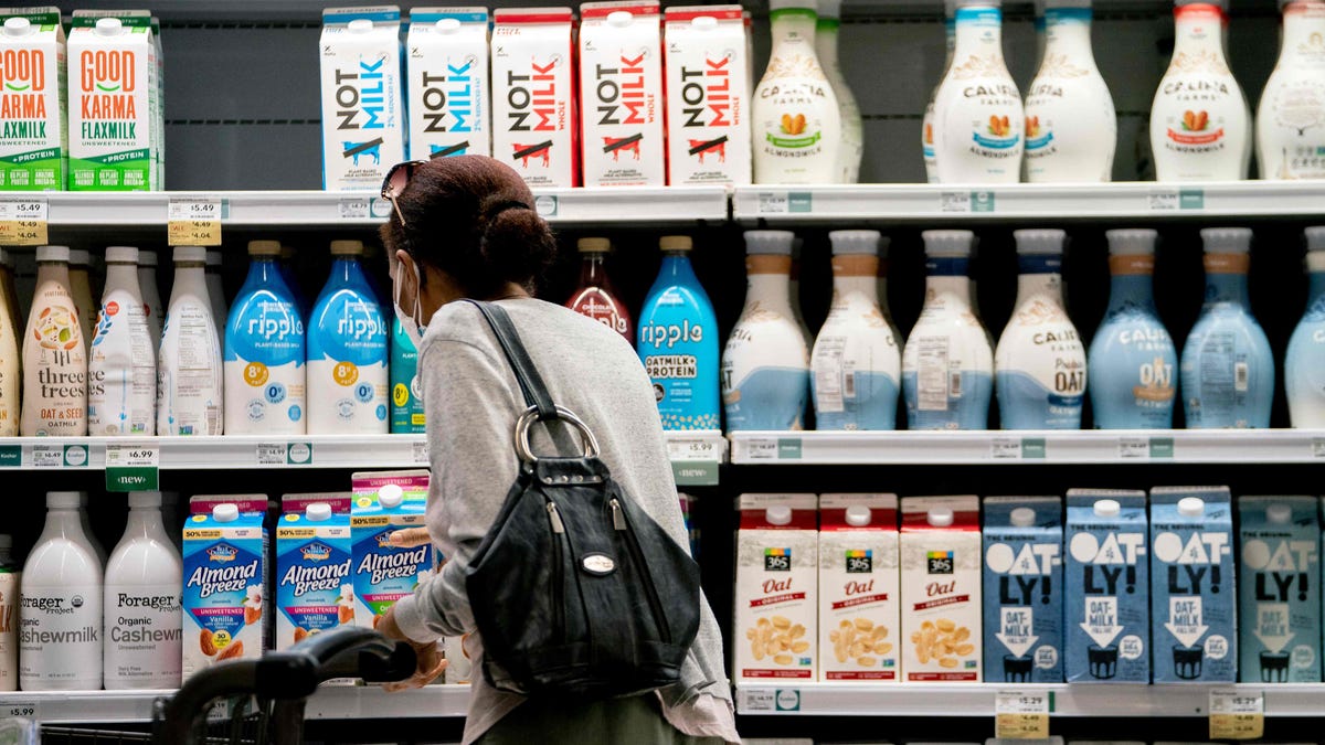 A shopper walks through a grocery store in Washington, DC, on June 14, 2022.