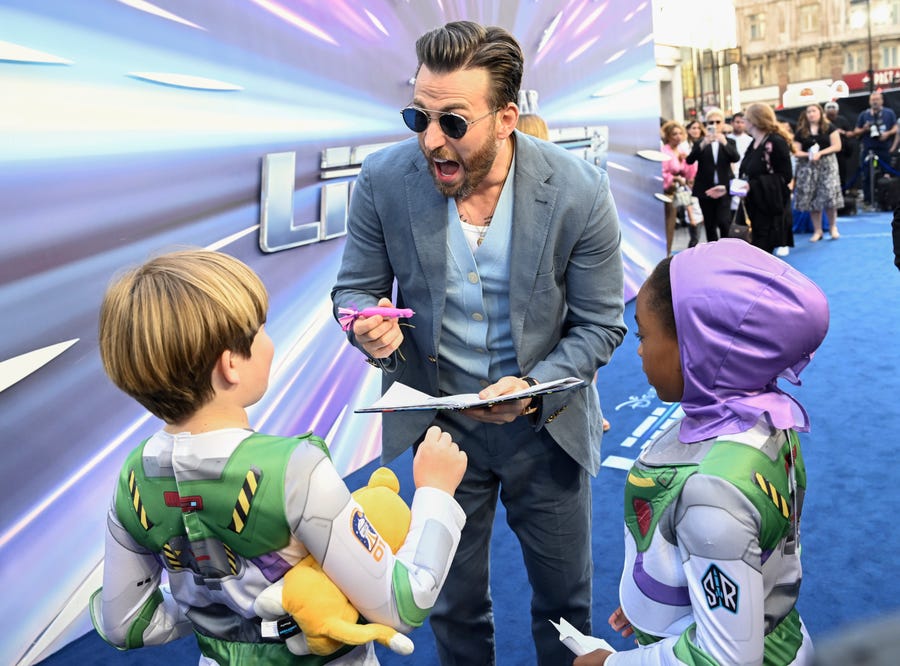 LONDON, ENGLAND - JUNE 13:  Chris Evans is interviewed by young fans at the UK Premiere of Disney Pixars' "Lightyear" on June 13, 2022 in London, England.