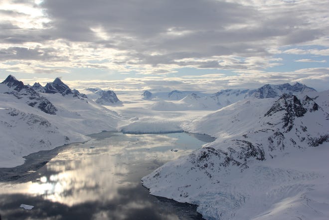 University of Texas researchers' computer models show that Greenland’s vertical glacier fronts might be melting faster than previously estimated.