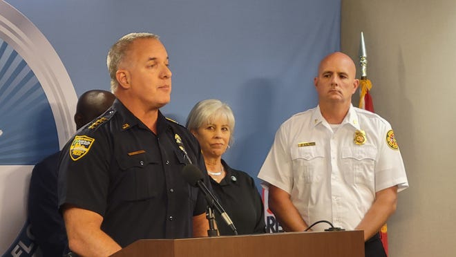 Then-Undersheriff Pat Ivey (left) answers questions about Sheriff Mike Williams' status at a June 1 hurricane season news conference.