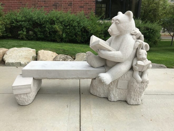 The Bear & Bunny Bench is on display at the Edina Community Library in Minnesota.