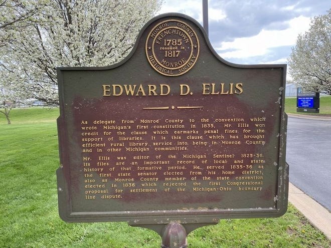 The Michigan Historical Marker for Edward D. Ellis.  Ellis served as the editor of the Michigan Sentinel, Monroe’s first newspaper.  He was also a Michigan Delegate who, in 1834, helped write the Michigan Constitution, establish Michigan public libraries, and earmark penal funds for library funding. Provided photo