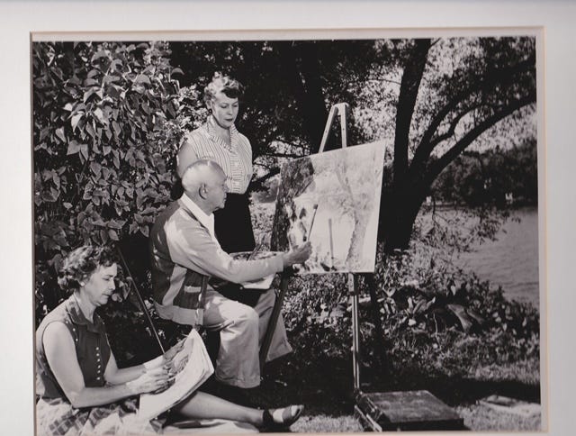 This South Bend Tribune photo shows local artists Beatrice Hartig-Zimmerman, on the ground, A.E. (Arthur) Hartig and Genevieve (Geni) Hartig-Toth in the 1940s. The two women were Hartig's daughters, and all three of them were professional artists. Their descendants are holding a sale of their works June 18 and 19, 2022, at Osceola United Methodist Church.