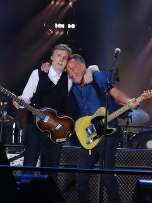 Bruce Springsteen joins Paul McCartney on stage June 16 at MetLife Stadium in East Rutherford.