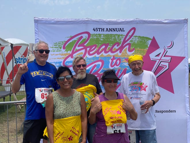 The members of team Aging Racefully take a post-race photo following the 45th annual Beach to Bay Relay Marathon Saturday, May 21, 2022.