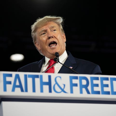 Former President Donald Trump addresses the partic