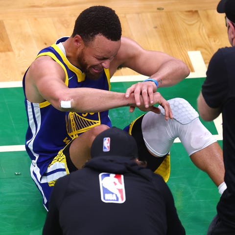 Stephen Curry breaks down in tears as the Warriors