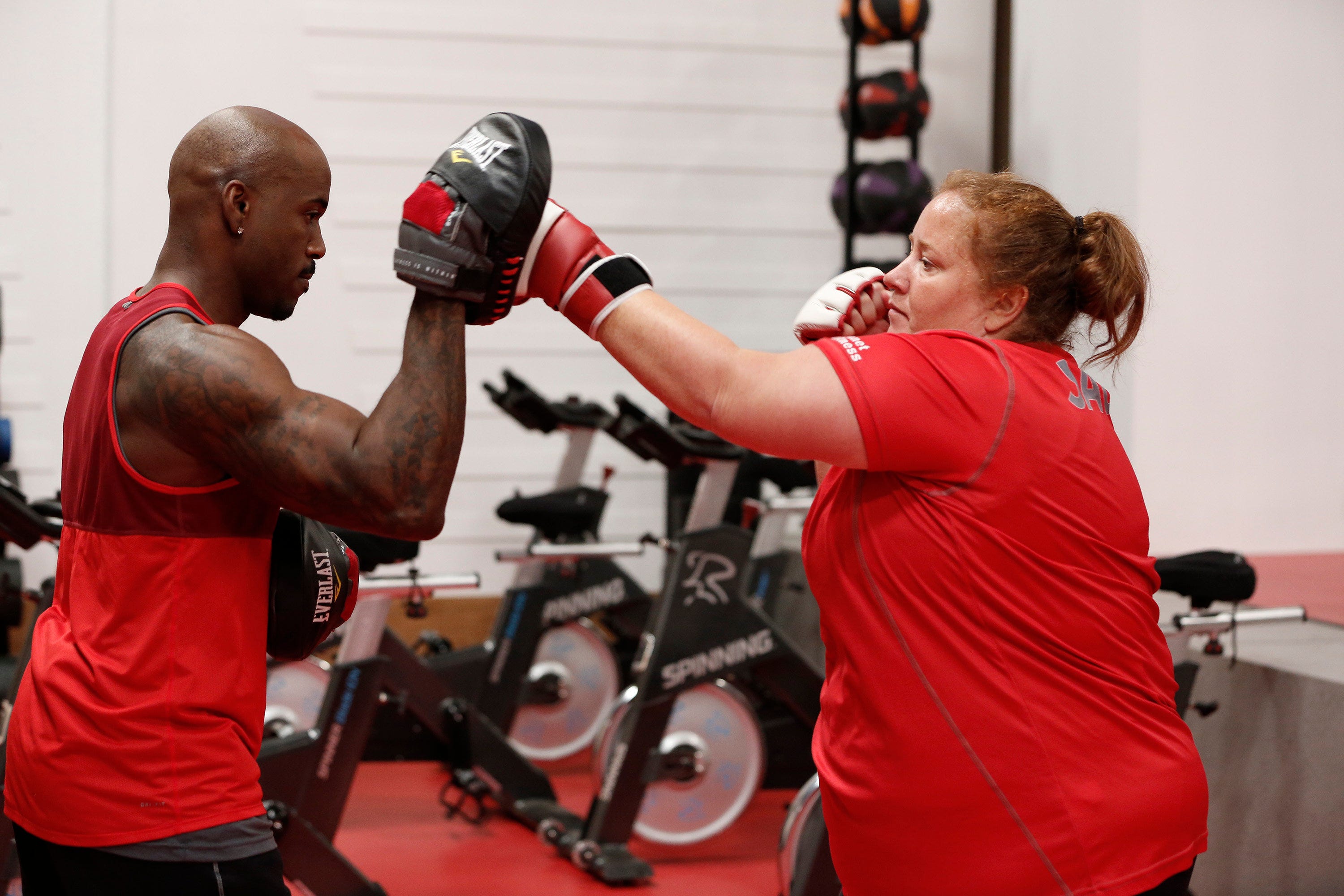 Dolvett Quince works with Jacky Kmet on "The Biggest Loser." The TV show ran on NBC for 17 seasons, following participants as they lost weight through diet and exercise.