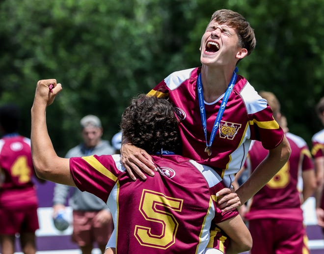 The Weymouth High boys rugby team celebrated winning the Division 2 state championship against Hanover at Curry College on Saturday, June 18, 2022.