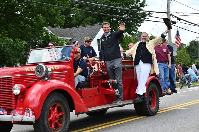 RUTLAND - The Rutland Fire Department, along with Worcester County Sheriff Lew Evangelidis, takes part in the fire truck parade after the presentations at the gazebo for Rutland's 300th celebration on Saturday, June 18. The 95th annual Wachusett Muster was hosted by Rutland immediately after the parade.