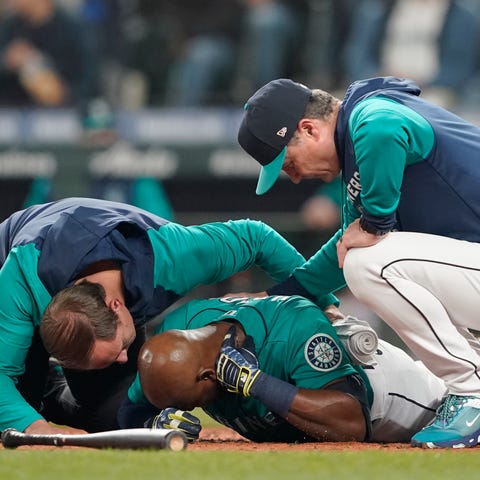 Seattle Mariners outfielder Justin Upton points to