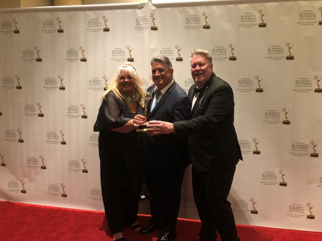 Producer Kyle Radke, Palm Springs Air Museum Vice Chairman Fred Bell and director/editor Phillip Large pose with the museum's Emmy Award Saturday, June 18, 2022 at the 48th Annual Pacific Southwest Emmy Awards at the Westin Mission Hills Resort in Rancho Mirage, Calif.