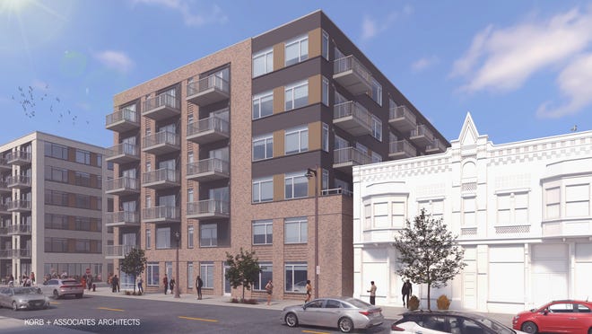 A new apartment building proposed for Walker's Point by New Land Enterprises LLC would be just across the street from New Land's newly completed Element Apartments (left).