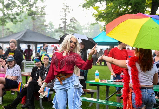 Kassie Kain (Kolbey Weier) winks at an audience member while working the crowd in a drag show on Saturday, June 11, 2022, at Pioneer Park for Brookings Pride.