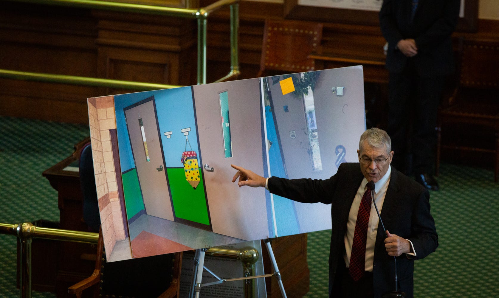 Texas Department of Public Safety Director Steve McCraw uses photos to explain what happened regarding the keys and doors during the Robb Elementary shooting to the state Senate's Special Committee to Protect All Texans during a hearing at the Capitol on June 21.