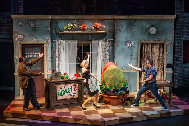 From left: Timothy Culver as Mr. Mushnik, Abby Stoffel as Audrey, Robert Miller (puppeteer) and Brian E. Chandler (voice) as Audrey II, and Morgan Mills as Seymour in "Little Shop of Horrors" at the Porthouse Theater.