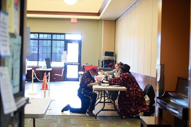 People cast their vote at The Salvation Army Kroc in Augusta on Tuesday.
