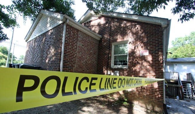 Police tape still lines the area near a fatal shooting that occurred early Tuesday morning, June 21, 2022, on Rankin Avenue in the Highland community.