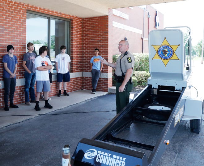 Illinois State Trooper Jason Wilson, District #7 safety officer, spoke with Kewanee High School's Summer Driver Education Class  June 16. Trooper Wilson brought with him the "Convincer," a crash simulator used to illustrate the need to wear safety belts while driving.