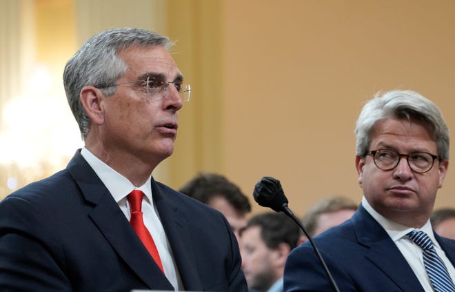 Georgia Secretary of State Brad Ravensberger, left, testifies before a House select committee investigating the Jan. 6 attack on the U.S. Capitol. On the right is Gabe Sterling, chief operating officer for the Georgia Secretary of State.