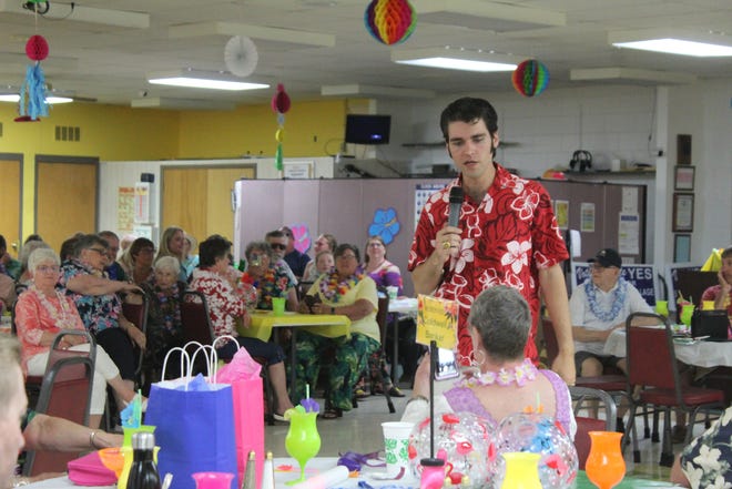 Elvis tribute artist Jake Slater wowed a sold-out crowd at the Cheboygan Area Council on Aging's Tropical Summer Party at the Sand Road Senior Center on Tuesday, June 21, with spot-on renditions of songs like "Blue Hawaii" and "Teddy Bear." The luau was the first big event the Council on Aging has been able to host since before the COVID-19 pandemic.