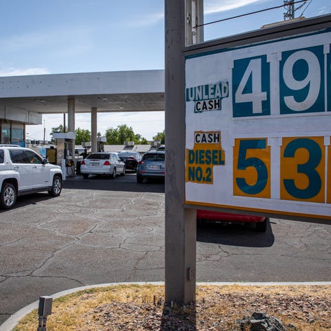 Customers line up for cheaper gas prices at the st