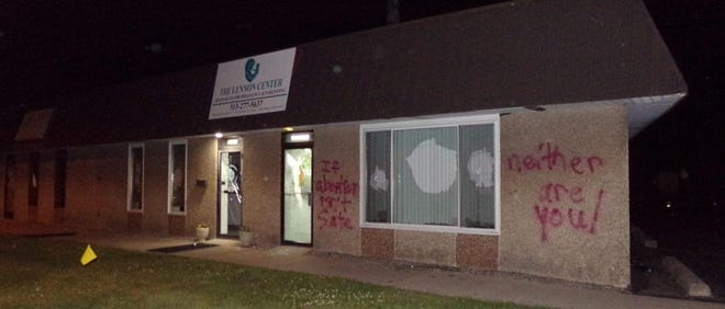 Vandals smashed windows and spray-painted a message reading: "If abortion isn't safe, neither are you."
