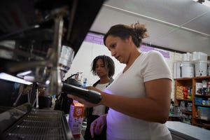 Imena Villegas, 16, watches as her mom Aida makes a vanilla latte at Cicter's Cafe in Buckeye.