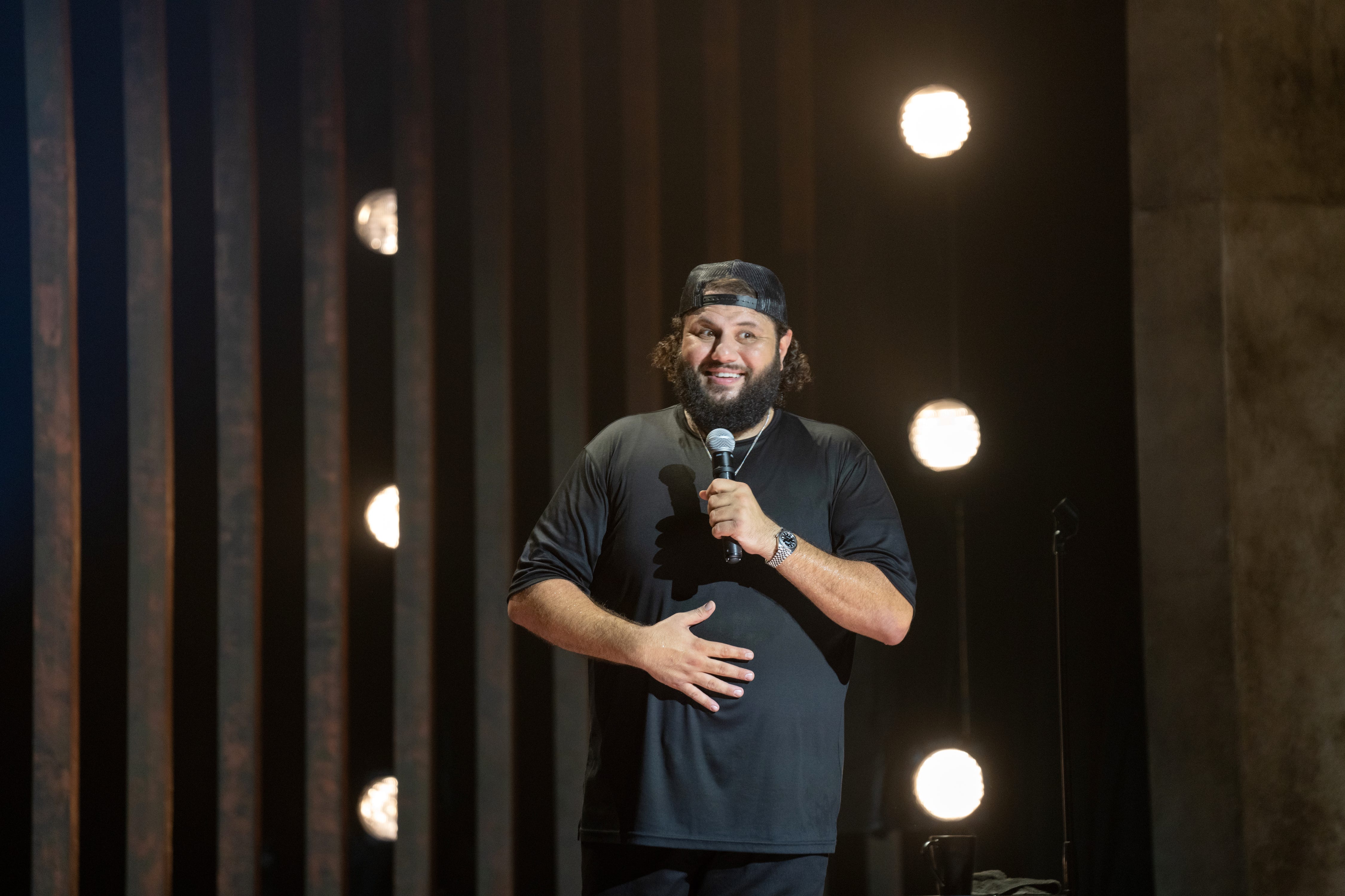 Mo Amer performs during his Netflix comedy special "Mo Amer: Mohammed in Texas."