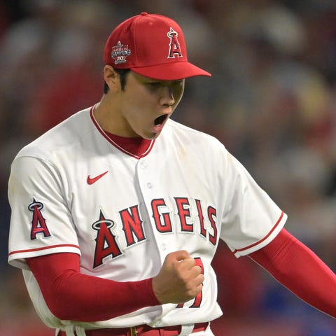 Shohei Ohtani reacts after the final out of the ei