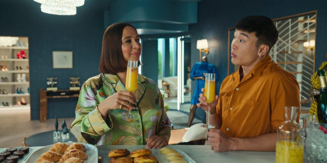 Maya Rudolph, left, and Joel Kim Booster spoof the uber-rich in Apple TV + comedy "Loot."