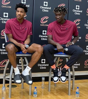 Cavaliers draft picks Ochai Agbaji (left) and Khalifa Diop during their introductory press conference Friday in Independence. [Marla Ridenour/Beacon Journal]