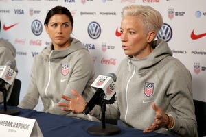 United States women's national soccer team member Alex Morgan, left, listens as teammate Megan Rapinoe speak to reporters during a news conference in New York, Friday, May 24, 2019. Megan Rapinoe and Alex Morgan were included on the U.S. national team roster for the upcoming CONCACAF W Championship, which will determine four of the region’s teams in the 2023 Women’s World Cup.