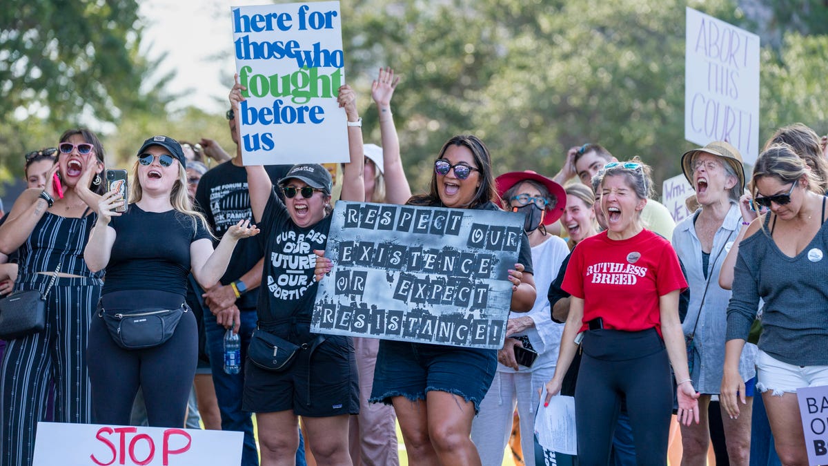 People yell to let out their emotions during a rally protesting the Supreme Court decision to overturn Roe v. Wade in West Palm Beach, Fla. on June 24, 2022.
