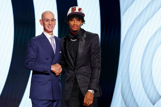 Shaedon Sharpe shakes hands with NBA commissioner Adam Silver after being selected by the Portland Trail Blazers with the seventh overall pick.