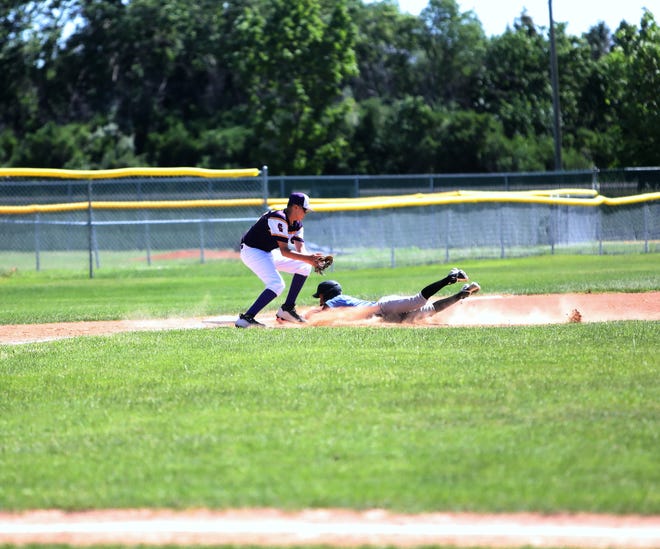 Aberdeen Smitty's 14-and-under Jehiel Aviles safely steals third base against Selby in the Vern Jark Memorial on June 25, 2022.