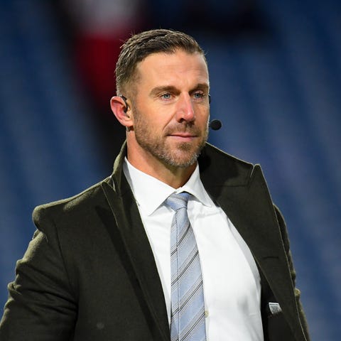 Alex Smith working as an ESPN analyst in December 