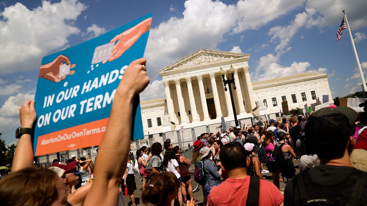 Jun 25, 2022; Washington, DC, USA;  Abortion rights protestors participate in a rally in front of the Supreme Court building the day after the court's ruling on Dobbs v. Jackson Women's Health Organization. Mandatory Credit: Josh Morgan-USA TODAY