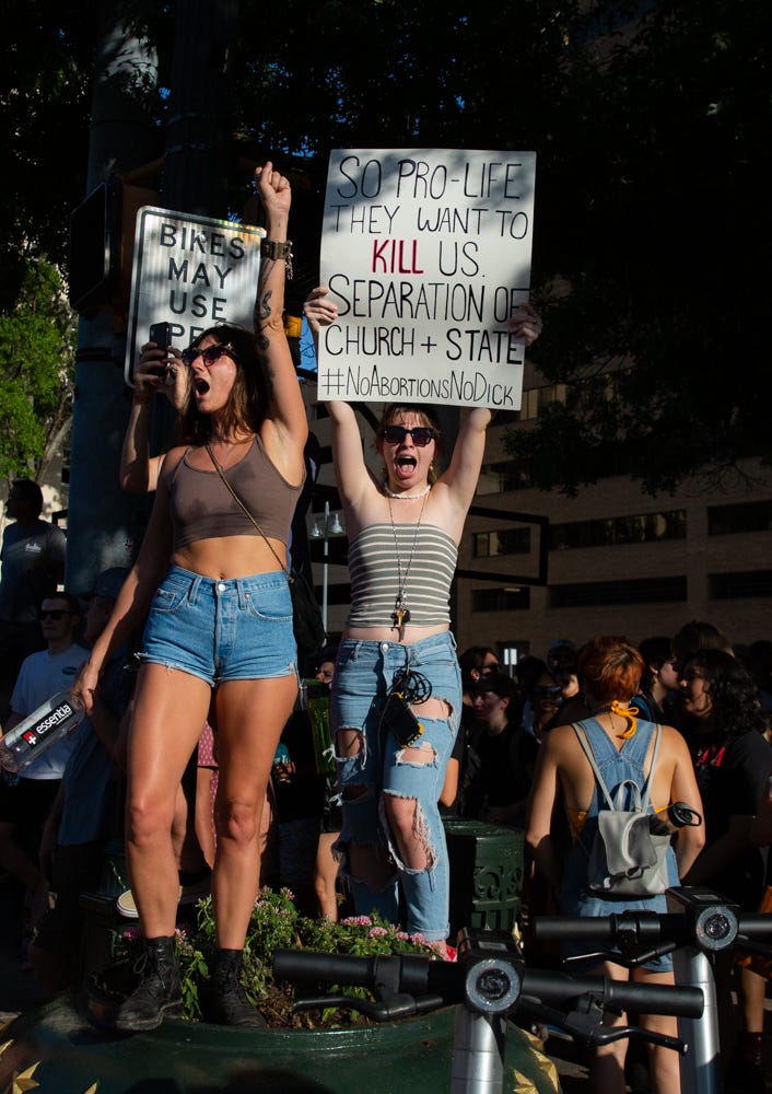 Abortion-rights protesters rally in downtown Austin, Texas, following the Supreme Court decision to overturn Roe v. Wade on June 24, 2022.